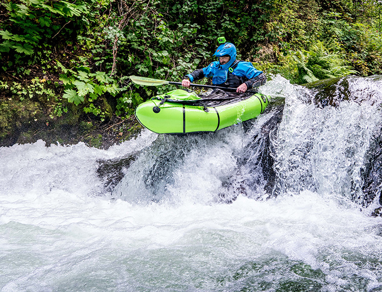 Dr. Jared Kern packrafting in the Chugach